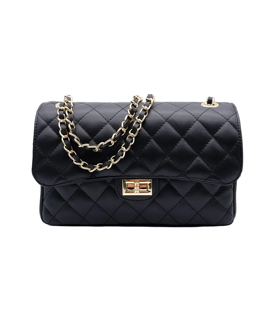Black quilted leather chain bag by Xchic Pelle, featuring a stylish design with a top handle and gold-tone hardware.